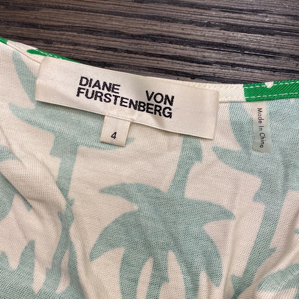 DVF Sleeveless wrap dress in white with green palm trees